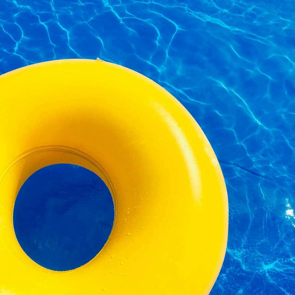 blue inflatable ring on orange surface