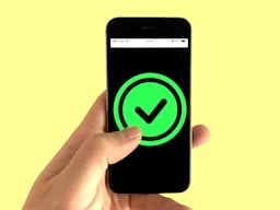 black android smartphone displaying green and black logo