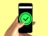 black android smartphone displaying green and black logo