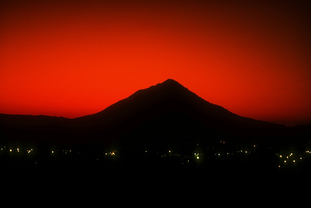 silhouette of mountain during sunset