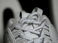 Close-up of sneaker details showing quality stitching and materials.