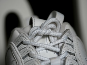 Close-up of a high-quality sneaker material showing texture and stitching.