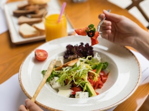 vegetable salad on white ceramic plate