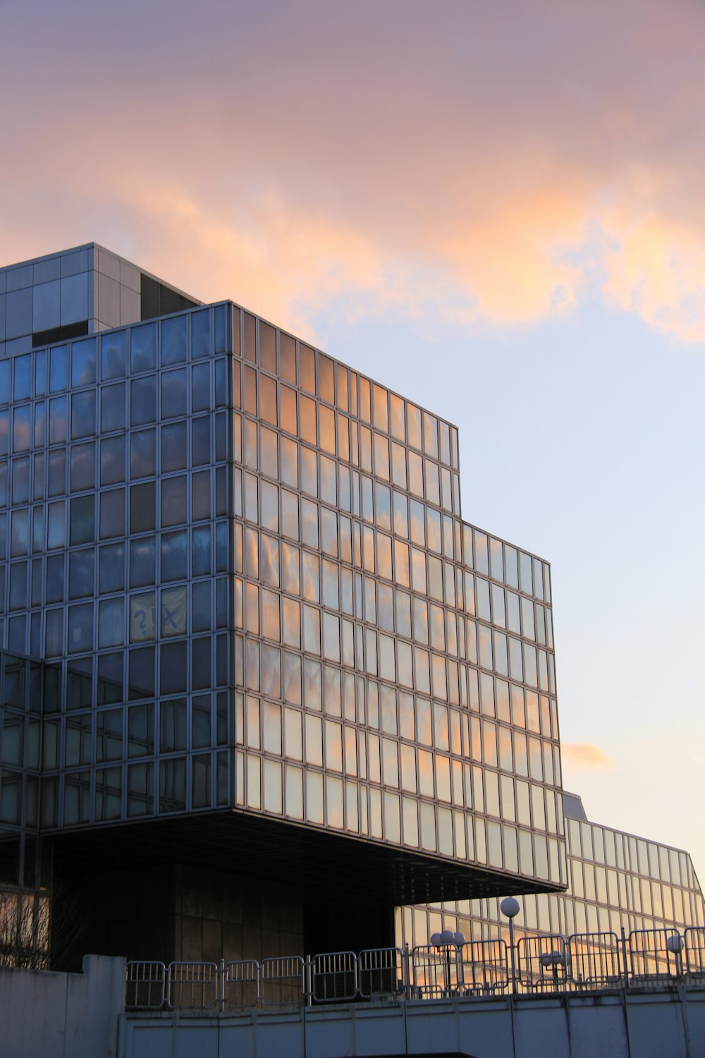 white and blue concrete building under blue sky during daytime