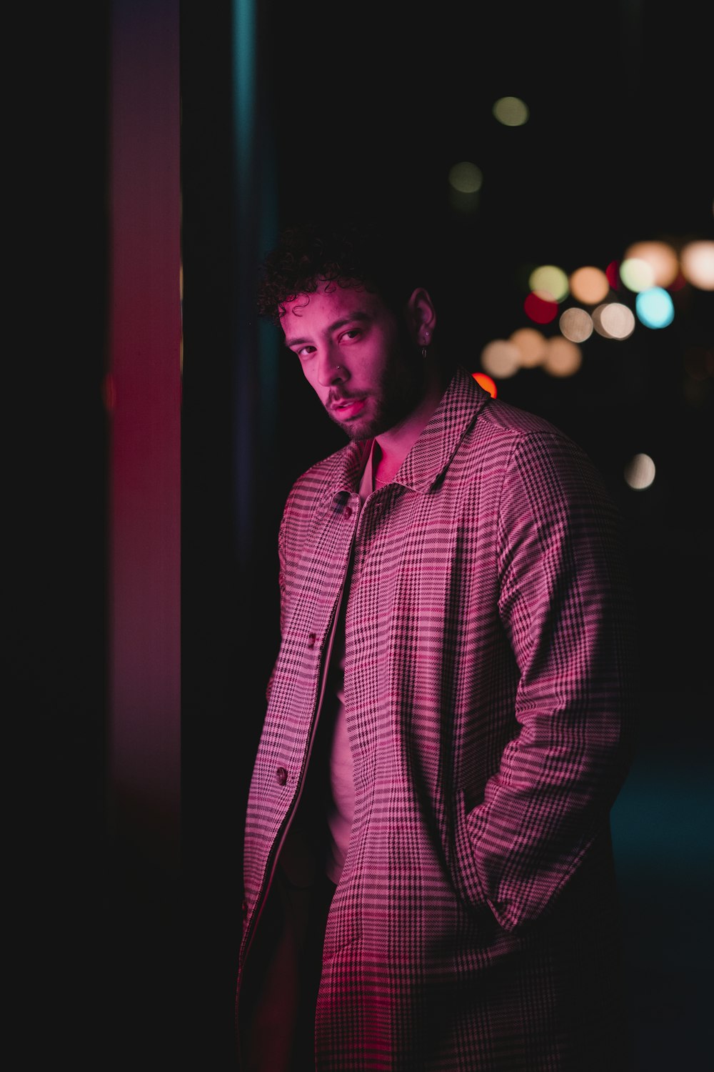 man in red and white pinstripe dress shirt