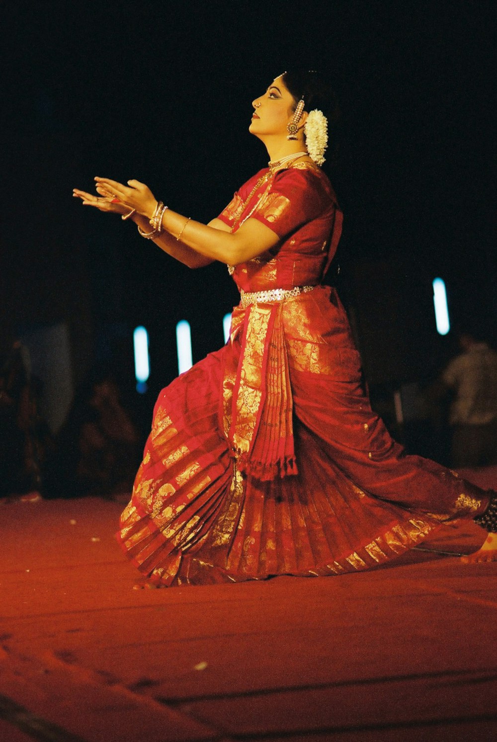 woman in brown dress dancing