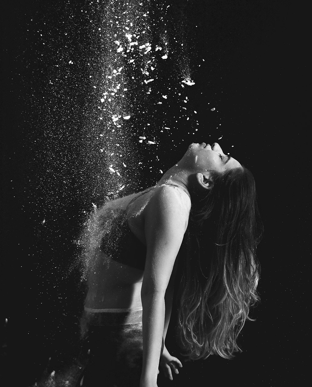 grayscale photo of woman in tank top