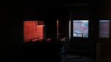 Bright room corner featuring a work desk and a large window with city views.