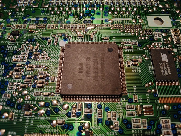 A close-up of a modern motherboard with intricate circuitry.