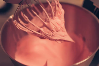 white plastic hair clip on white textile