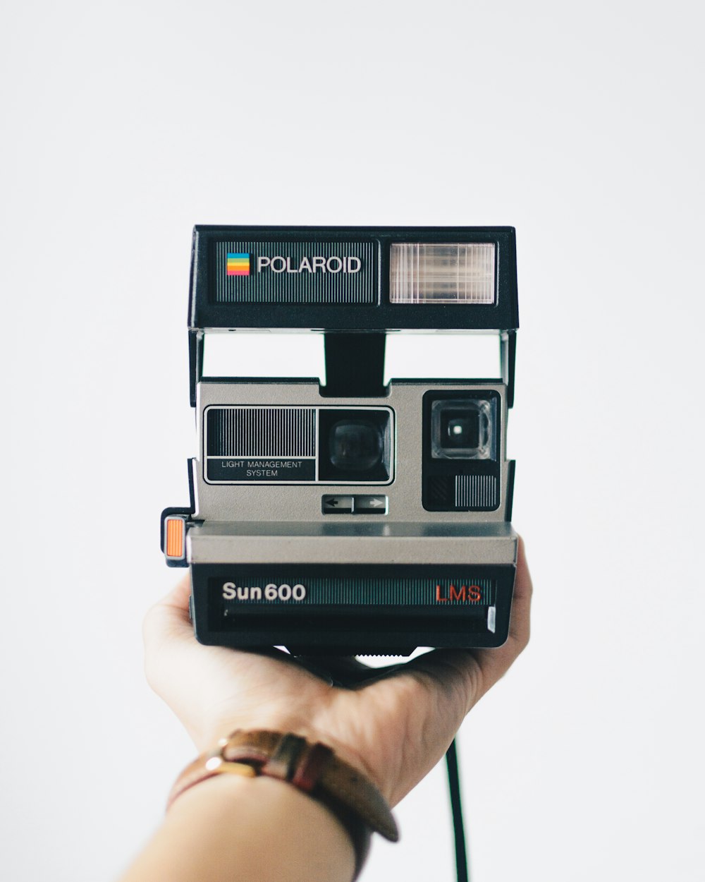 black and gray polaroid camera