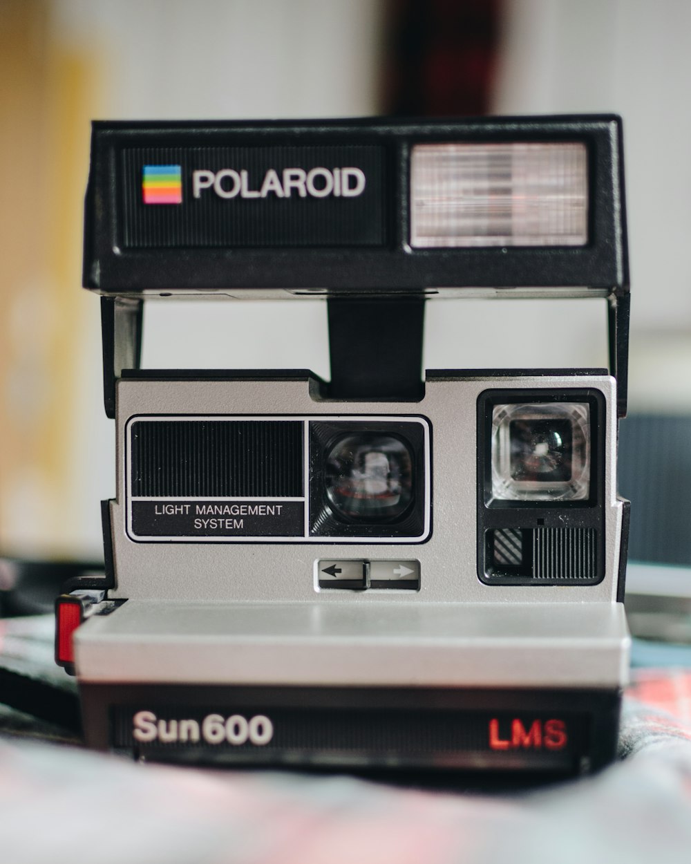 black and gray polaroid camera