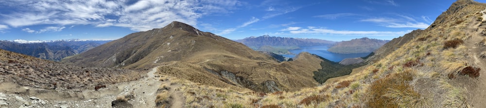 brown and green mountains under blue sky during daytime