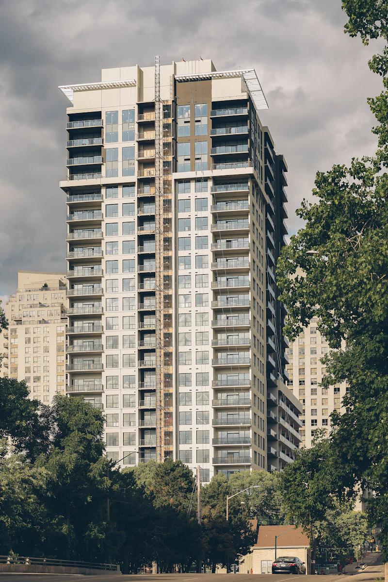Terraced housing stock photographed from a residential street, representing housing assurance coverage