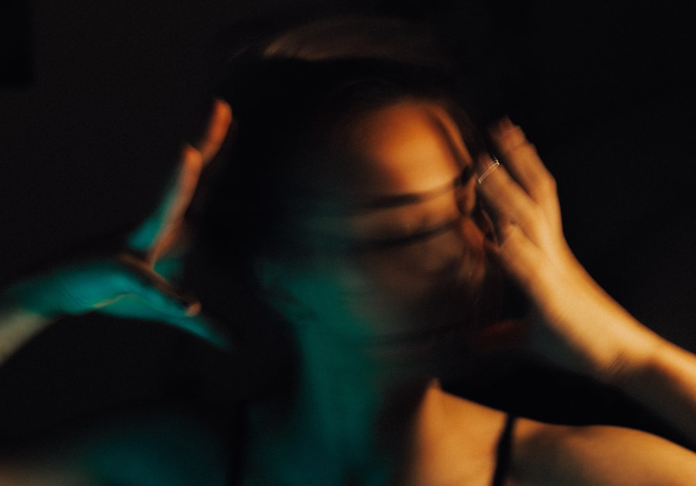 woman in black tank top wearing eyeglasses