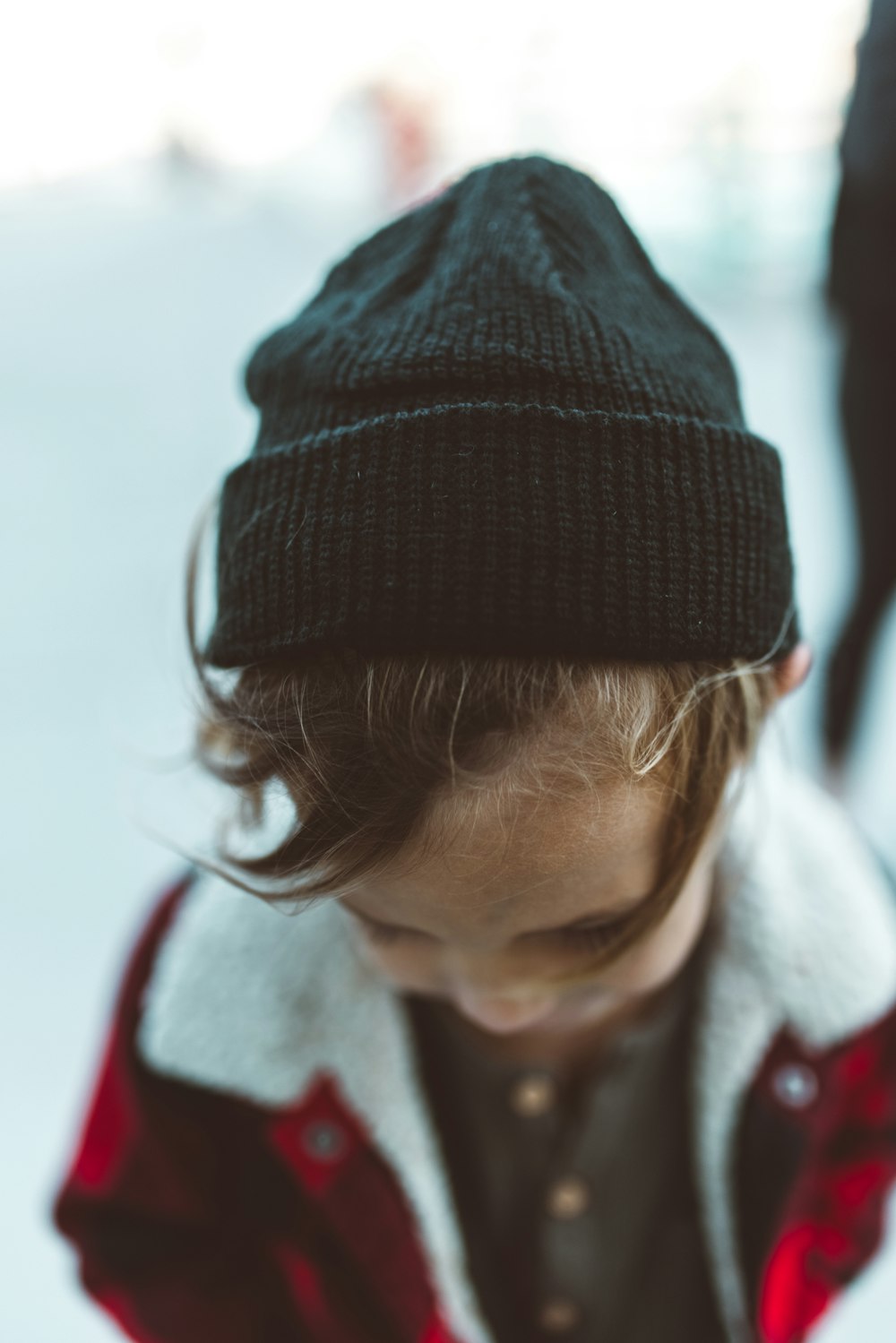 girl in black knit cap