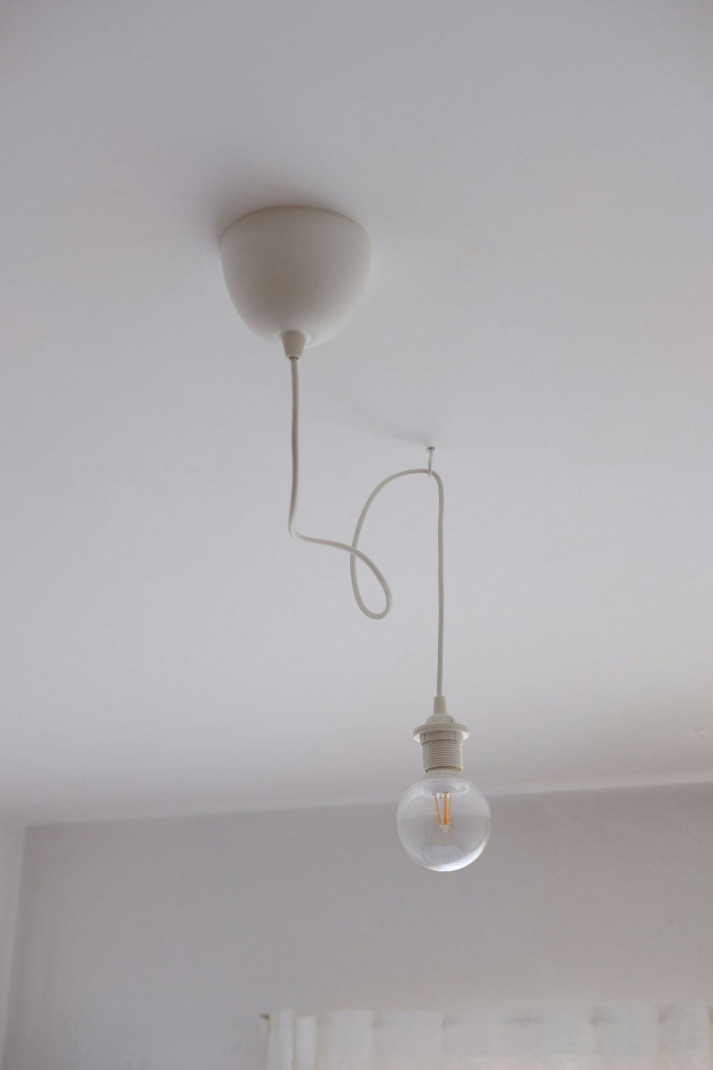 white pendant lamp turned off