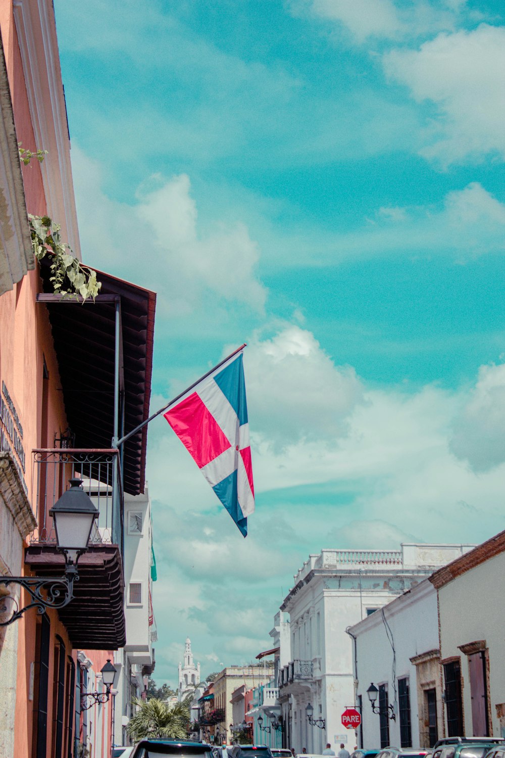 red white and blue flag on pole