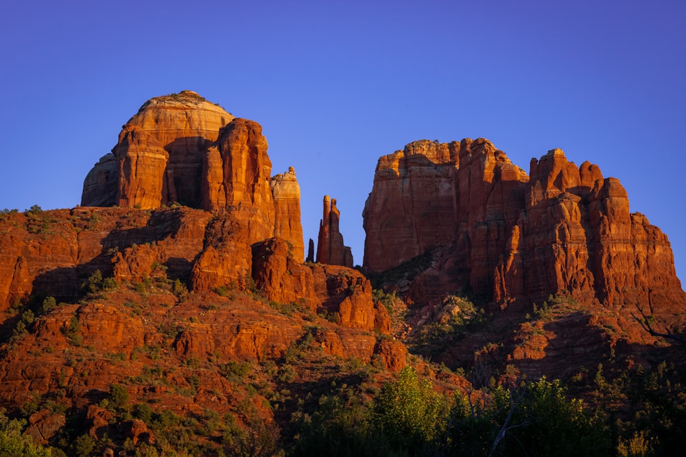 brown rock formation under blue sky during daytime