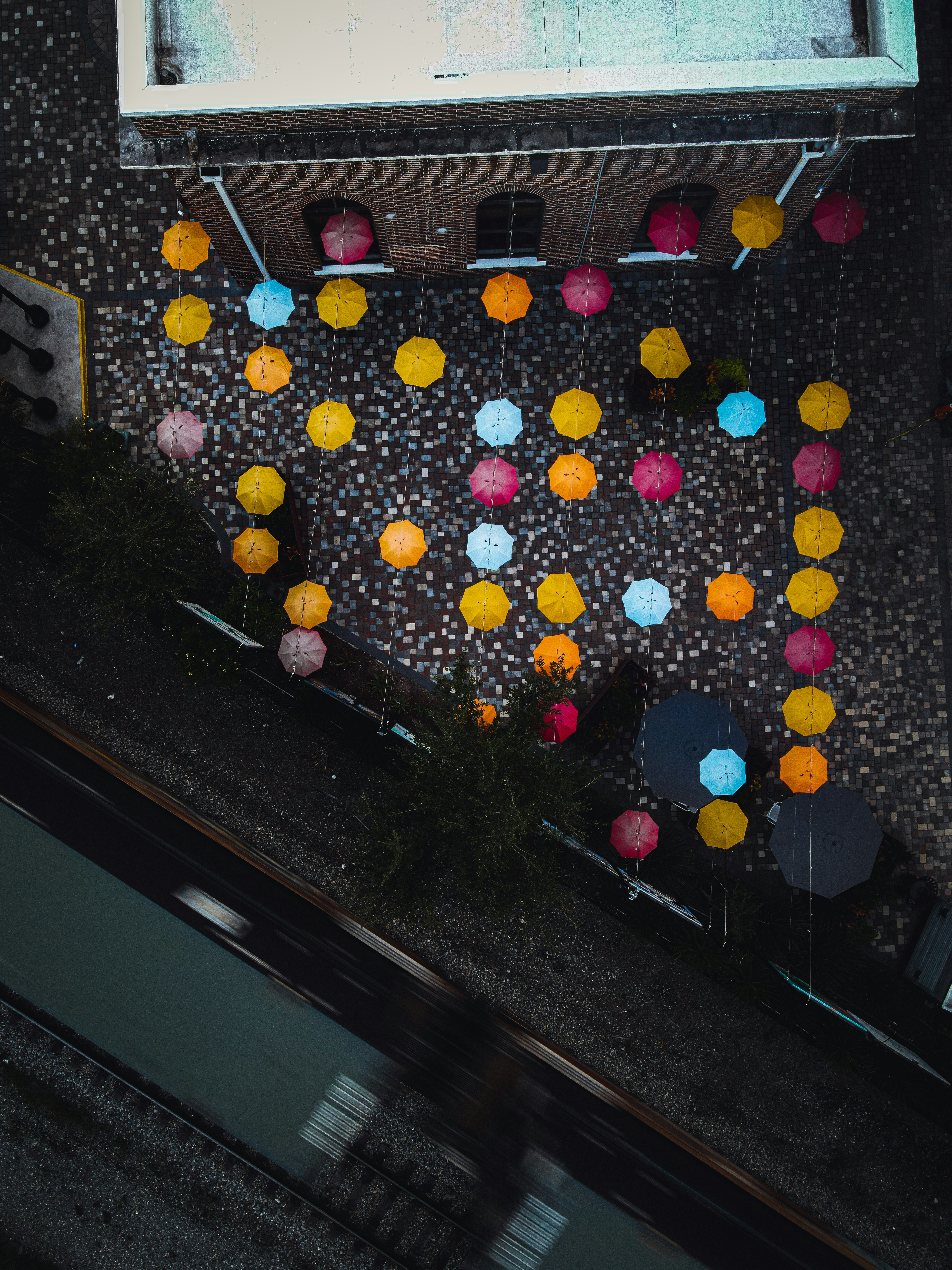 yellow and red balloons on street