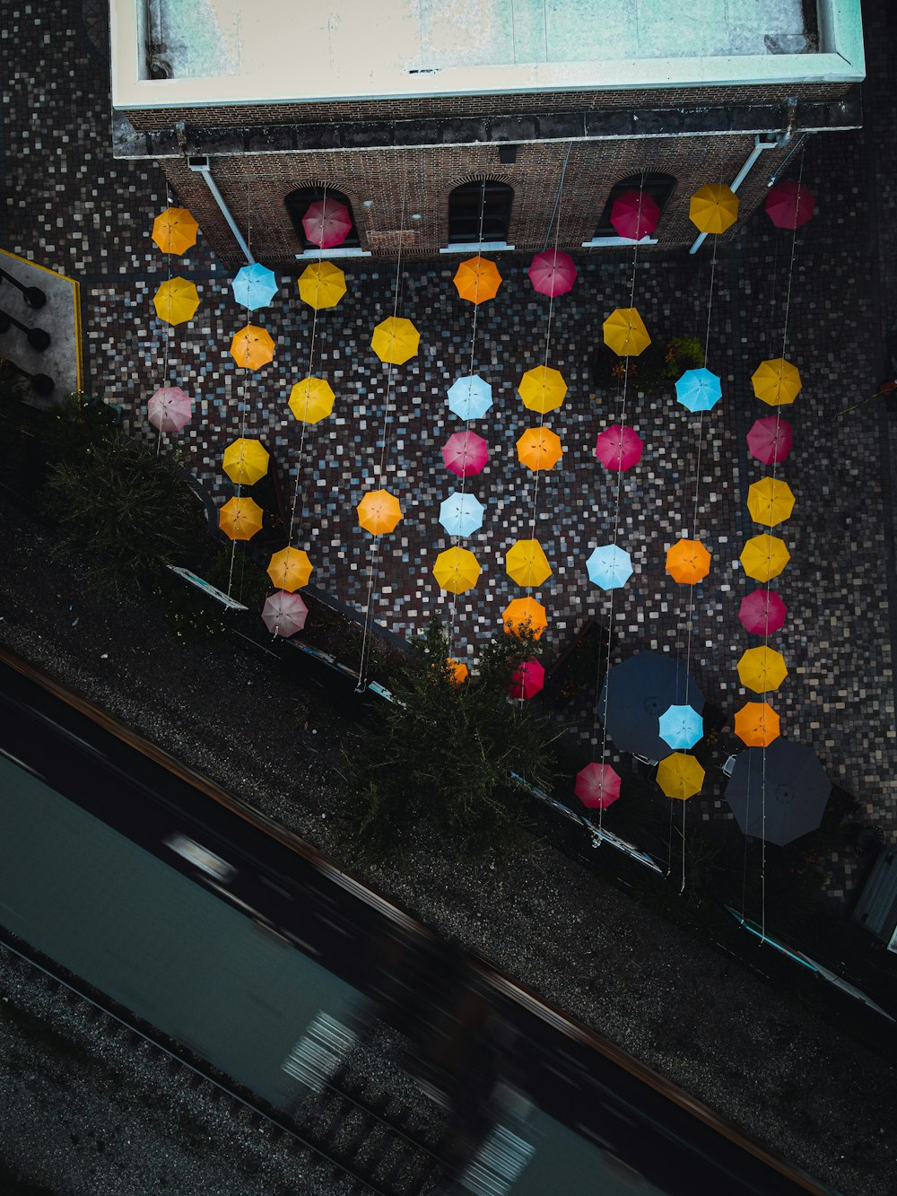 yellow and red balloons on street