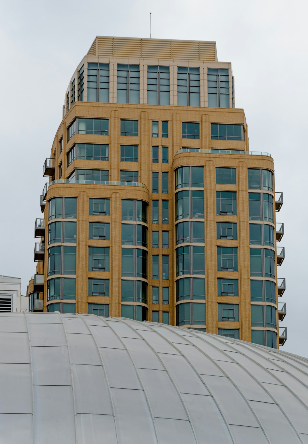 brown and white concrete building during daytime