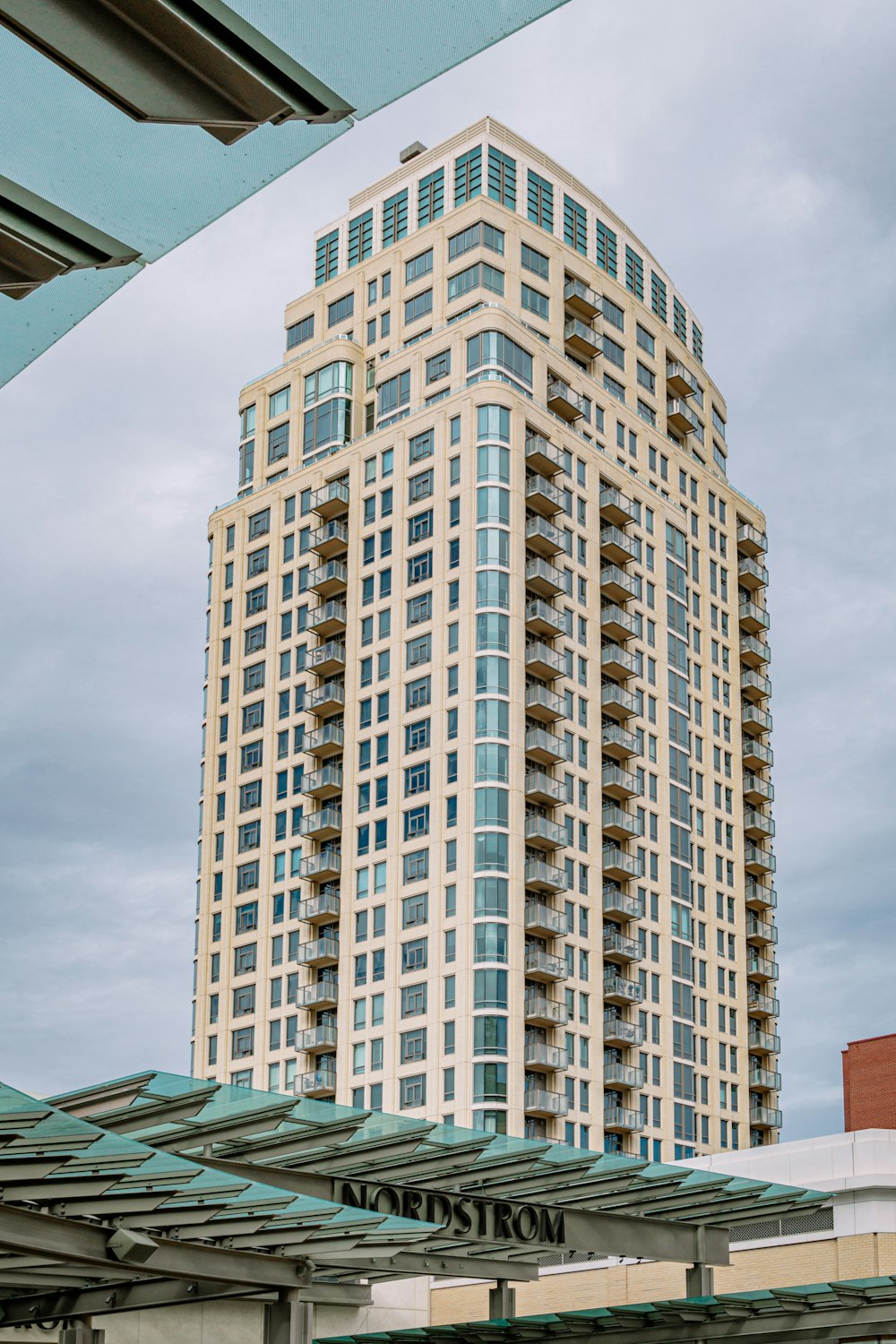 white and brown concrete building under blue sky during daytime