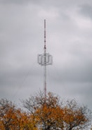 white and black basketball hoop under gray cloudy sky