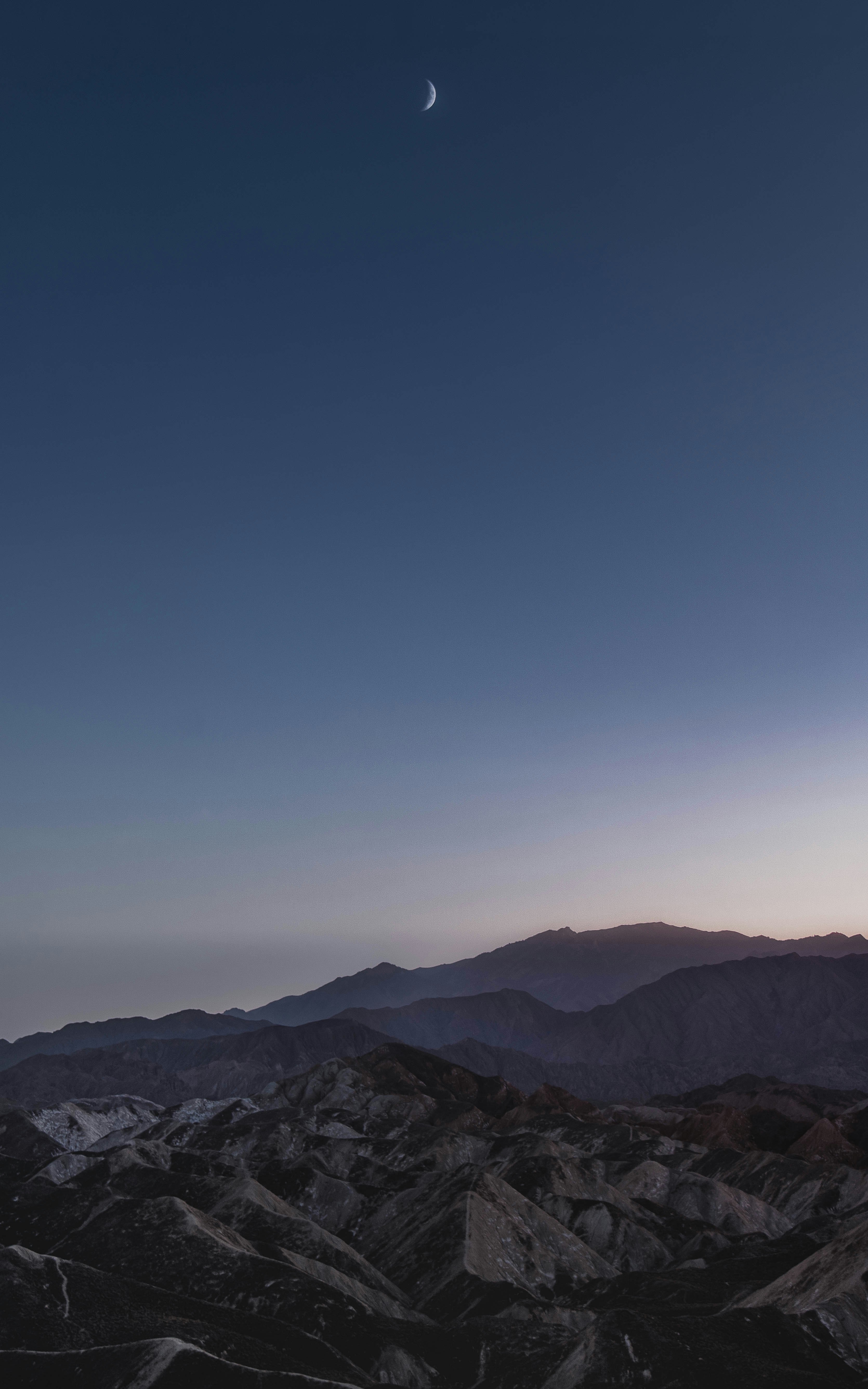 brown mountains under blue sky during daytime