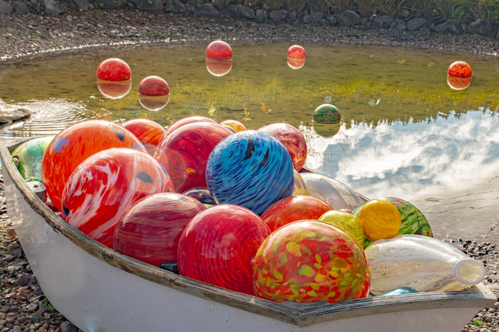 red blue and yellow balloons on boat