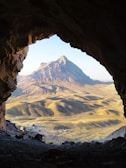 A scenic view of Sierra Nevada mountains from a rustic cave house in Marchal, Granada.