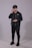 man in black zip up jacket and black pants