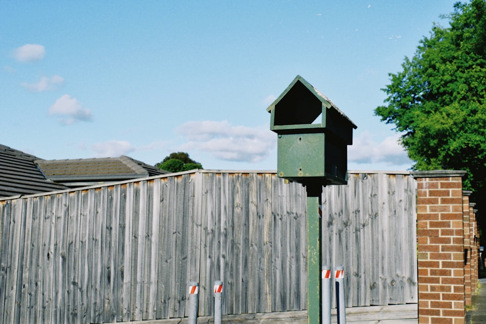 brown wooden fence under blue sky during daytime