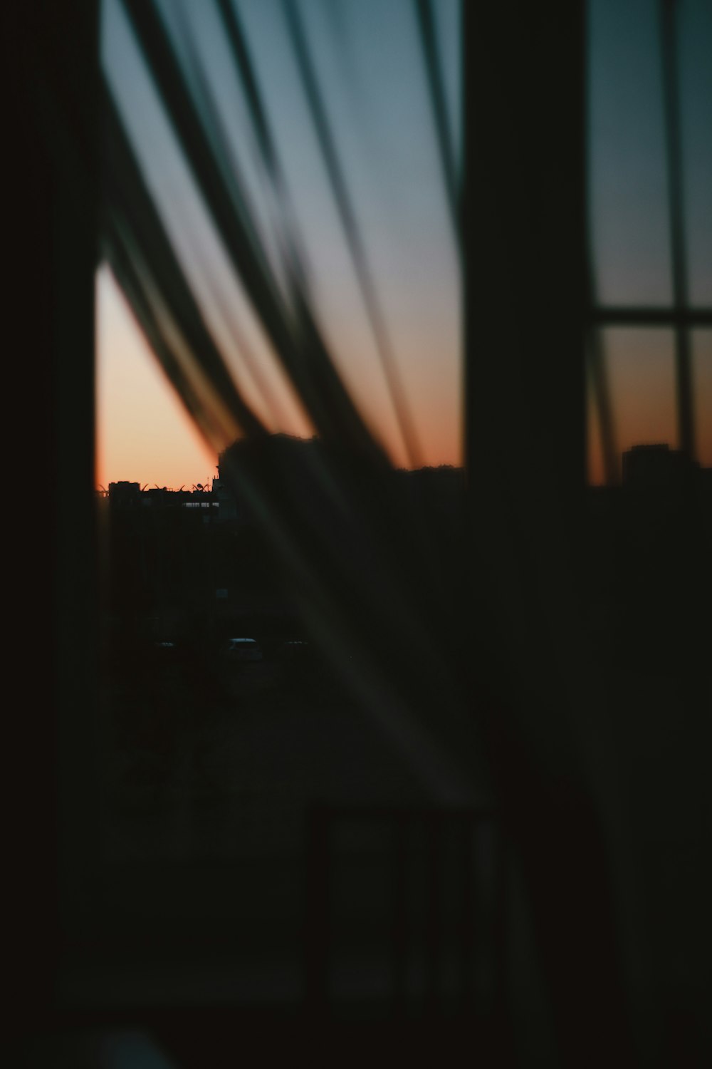 silhouette of buildings during sunset