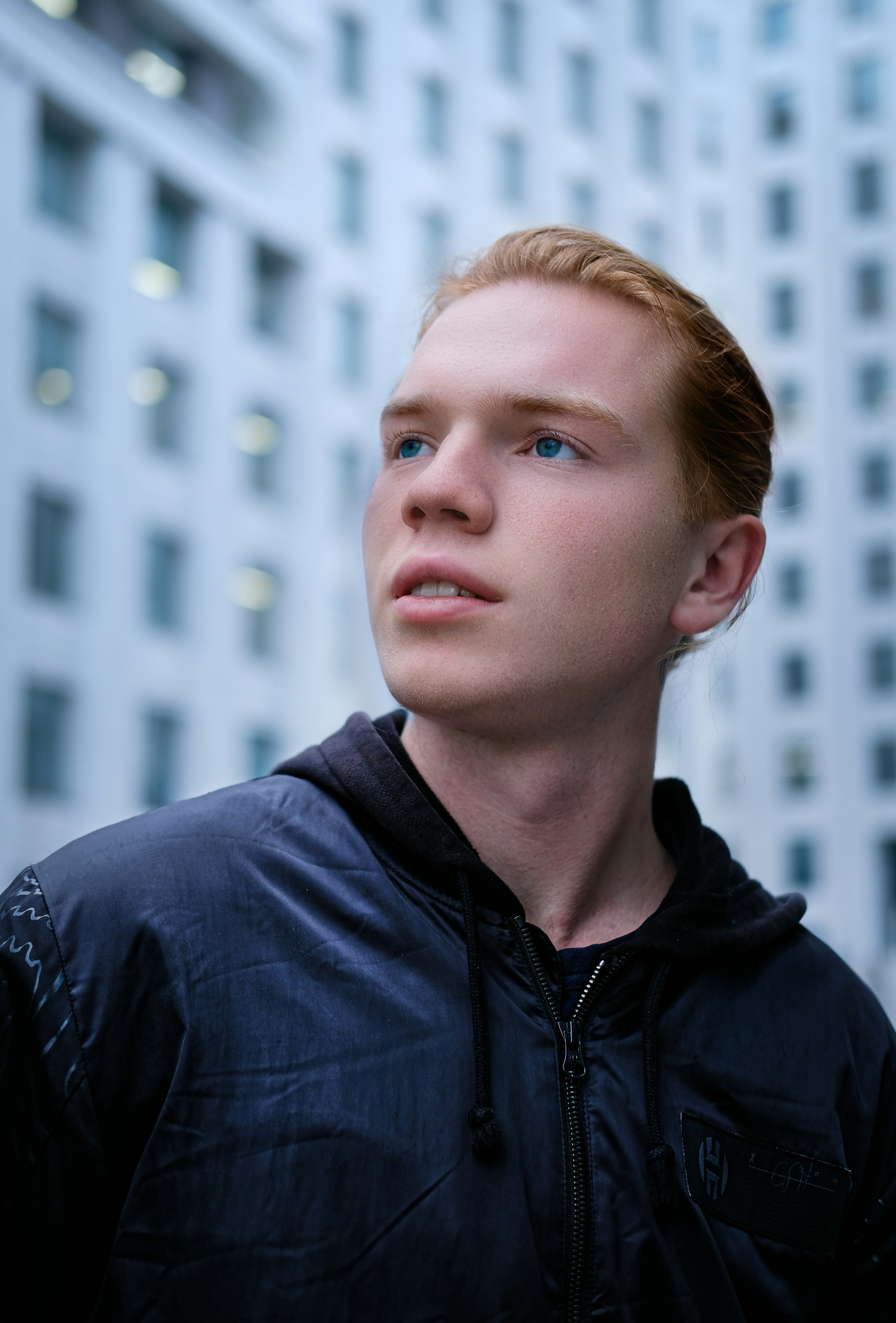 boy in black zip up jacket