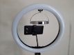Phone stand with built-in lighting set up for live streaming.