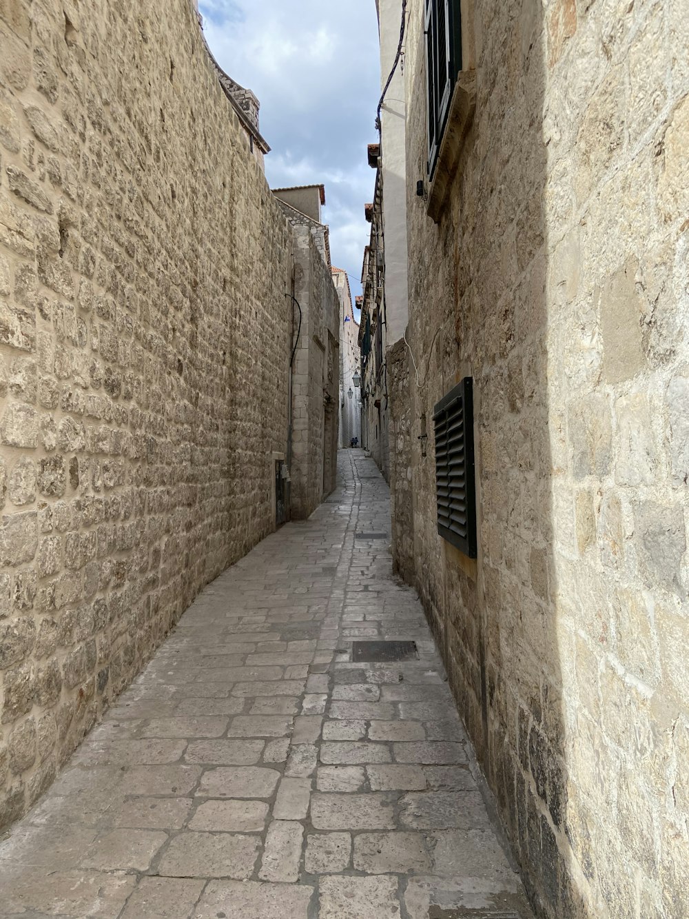 brown brick wall during daytime