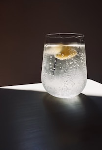 clear glass cup with water