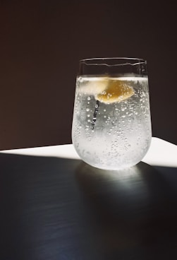 clear glass cup with water