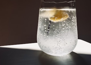 clear glass cup with water