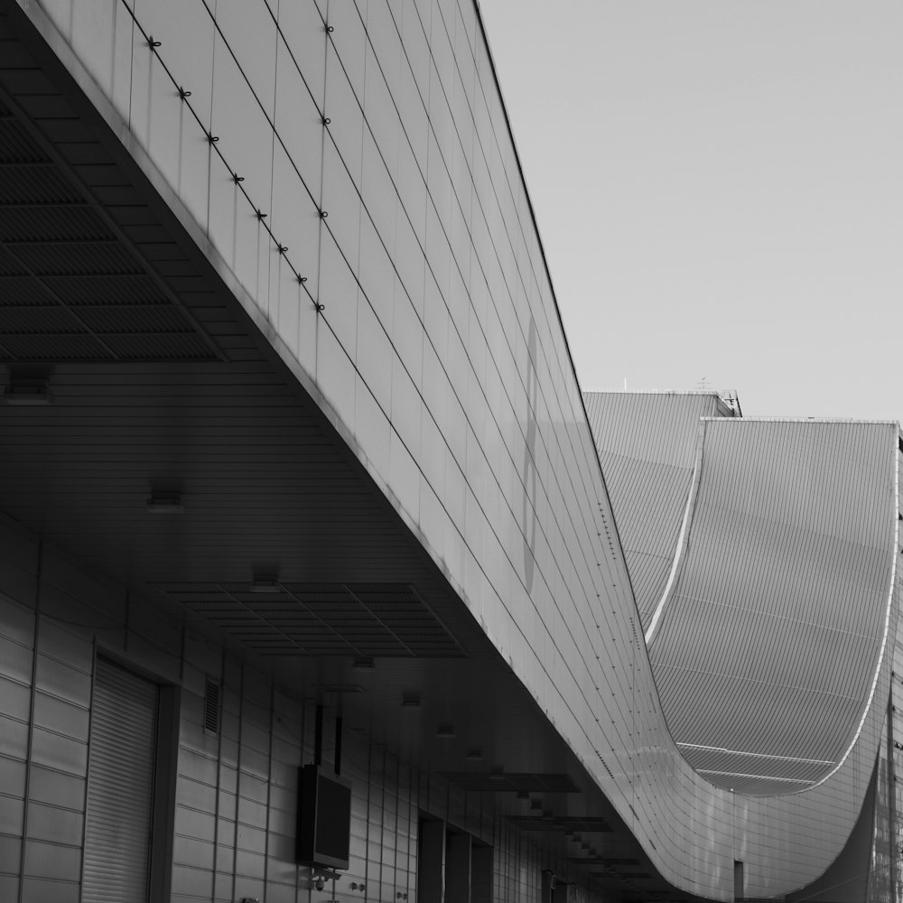 grayscale photo of a bridge