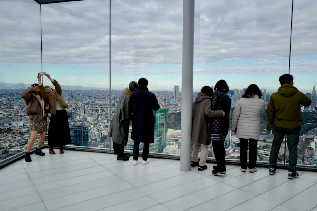 people standing on white floor tiles