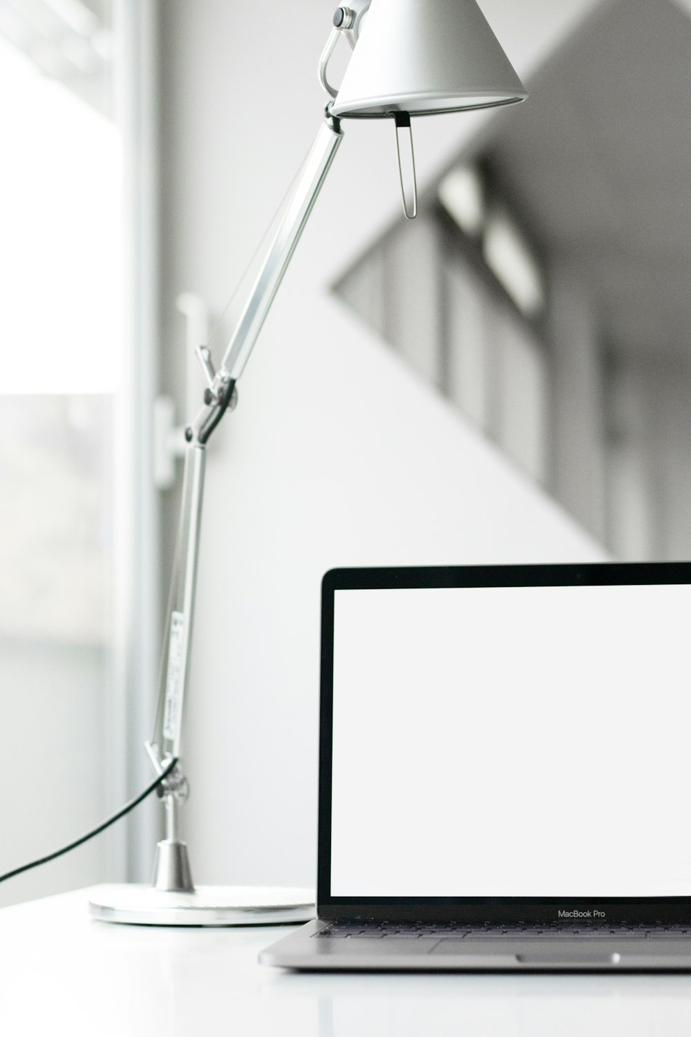 black and white frame with white coated wires