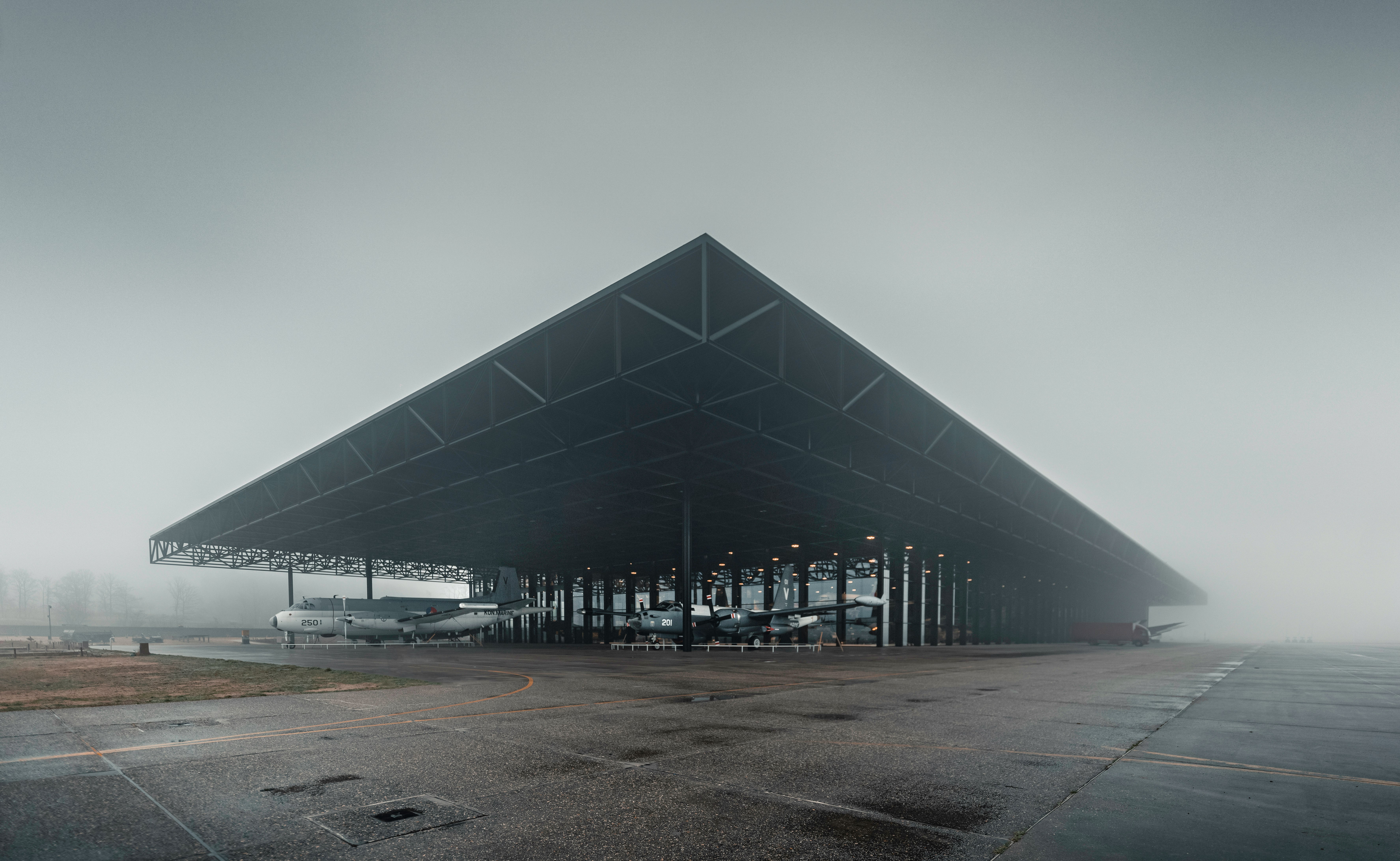 gray concrete building under gray sky during daytime