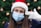 woman in red and white santa hat