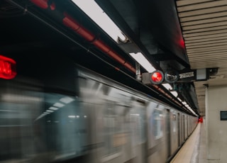 time lapse photo of a train station