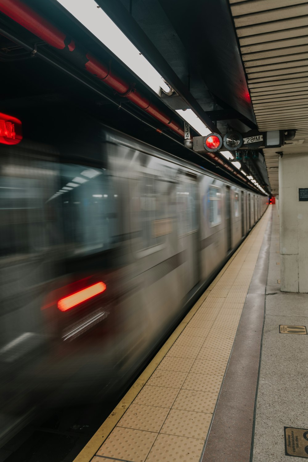 time lapse photo of a train station