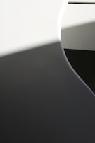 Abstract digital composition contrasting sharp lines with soft gradients.