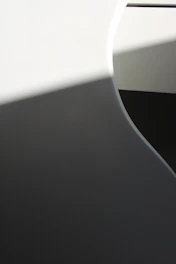 An abstract painting capturing the delicate interplay of shadow and light with soft, flowing lines.