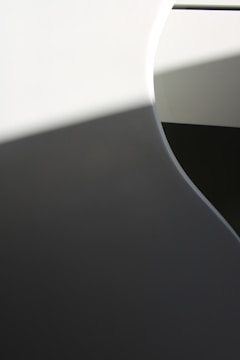 An artistic composition with abstract shapes and creative use of shadows.